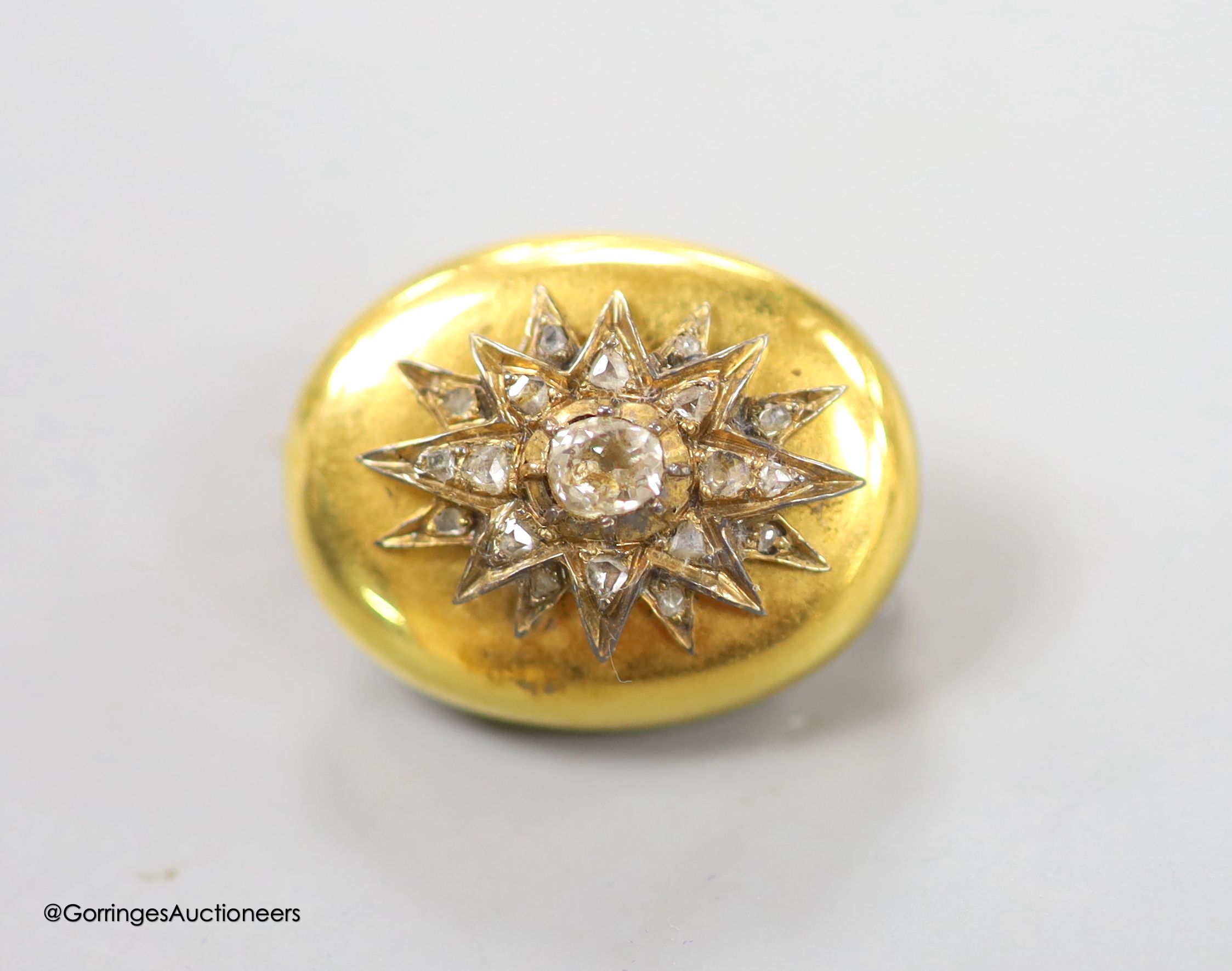 A Victorian yellow metal, oval and rose cut diamond set oval brooch, 21mm, gross weight 4.3 grams.